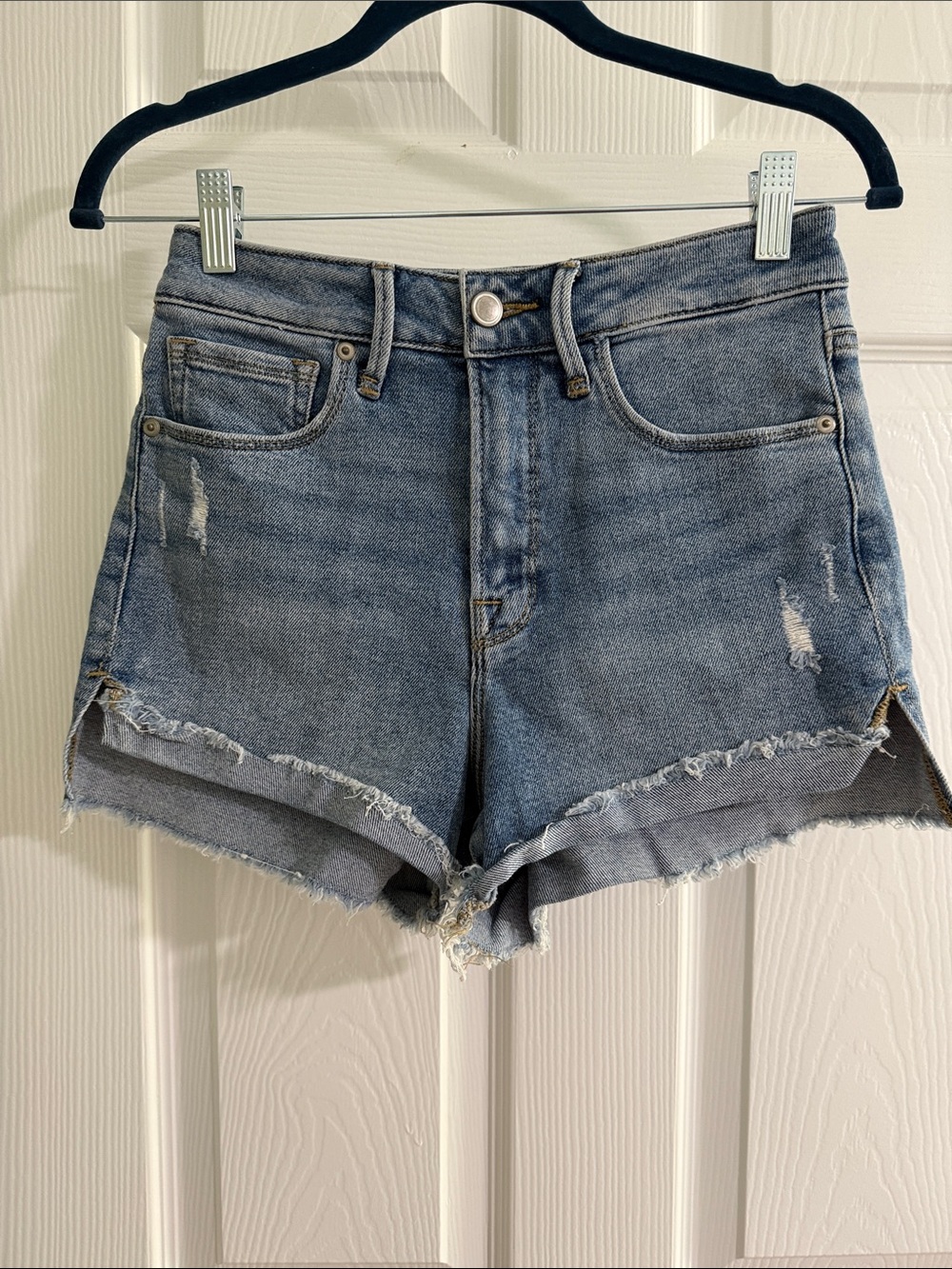 Good American Light Blue High-Rise Distressed Denim Shorts